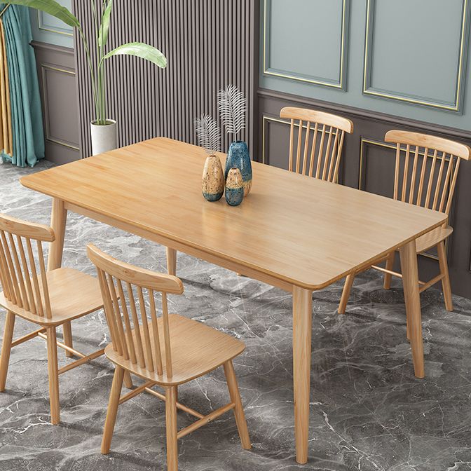 Modern Style Rubberwood Solid Wood Dining Table Brown Rectangle Table with 4 Legs for Home Use Clearhalo ' dining_table' 'Dining Tables & Seating' 'Dining Tables' 'furn' 'furn_dining_table' 'Furniture' 'furniture_dining_table' 'Kitchen & Dining Furniture' 'kitchen&dining_furn' 'kitchen' 'kitchen_dining_table' 1200x1200_052bca2b-2cd4-4fd1-825f-e3a7e60a9816