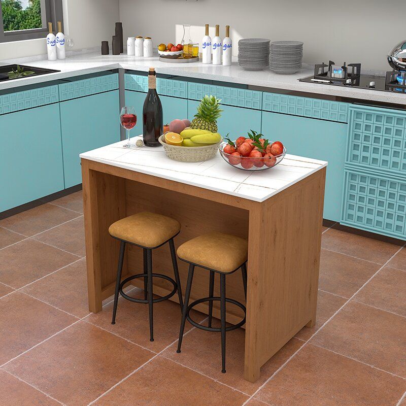 Tavolo da pranzo dell'isola con armadio in marmo di preparazione in marmo