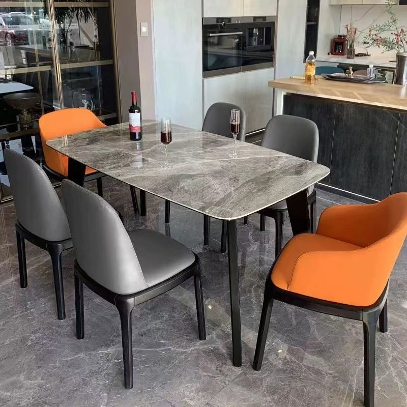 Eigentijdse stenen eettafel rechthoek eettafel met 4 houten benen in zwart