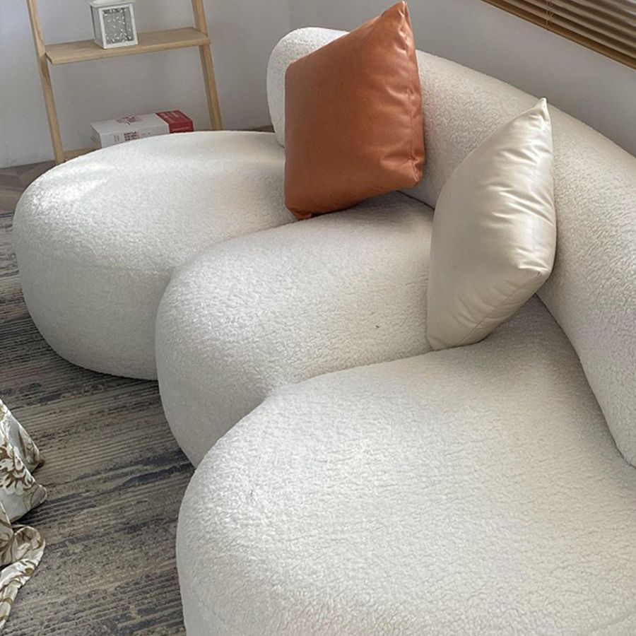 Canapé en laine de style contemporain dans un canapé rembourré en blanc incurvé