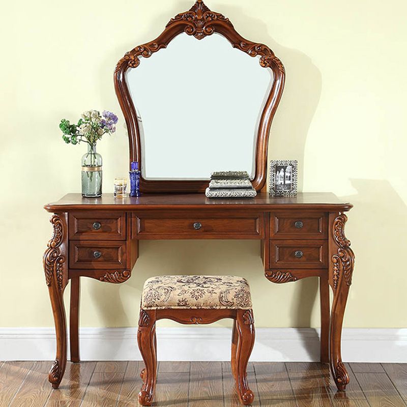 Vanità del tavolo da trucco marrone in legno massiccio con cassetti e specchio