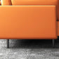 Canapé-oreiller orange en cuir faux en cuir avec jambes en métal