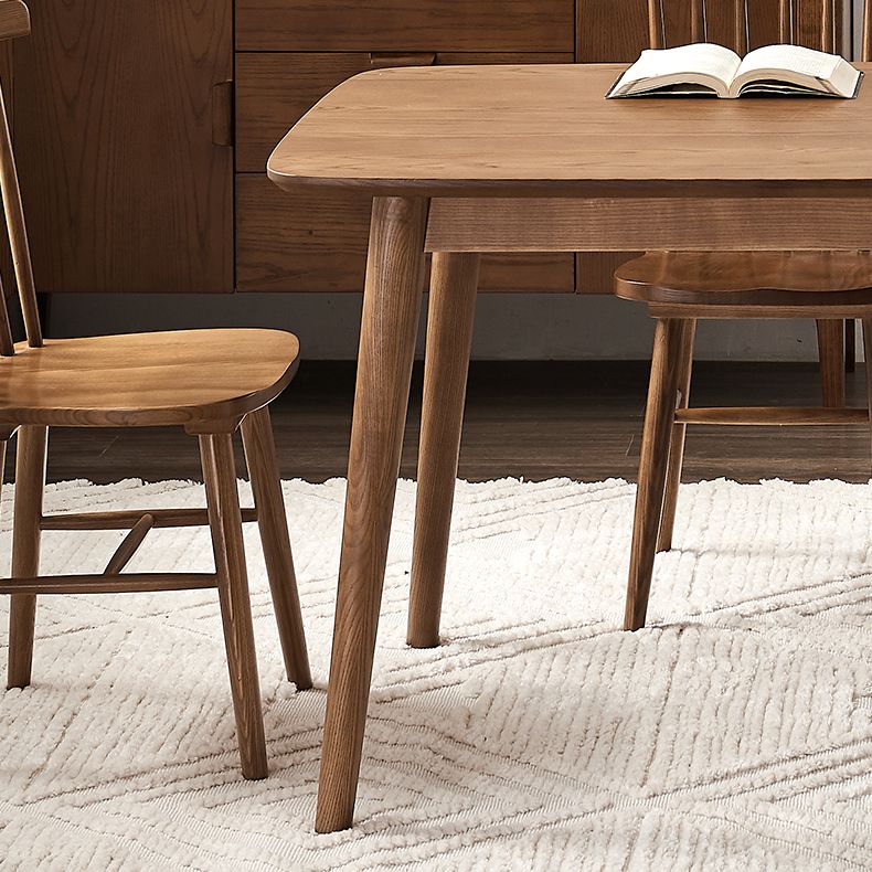 Modern Rectangular Space Saving Brown Walnut Dining Table with 4 Legs Clearhalo 'Dining Tables & Seating' 'Dining Tables' 'dining_table' 'furn' 'furn_dining_table' 'Furniture' 'Kitchen & Dining Furniture' 1200x1200_0babde2b-69db-4e5e-95ee-d2edcef87d97