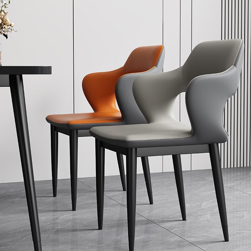 Sedia laterale aperta moderna in pelle imbottita sedia da pranzo senza braccio con base in metallo