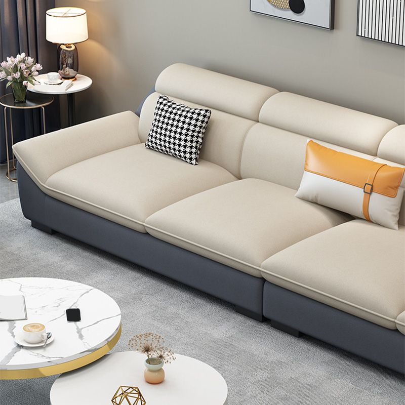 Nordic Faux Leather Sectional in Beige Flared Arm Sectional with Pillows