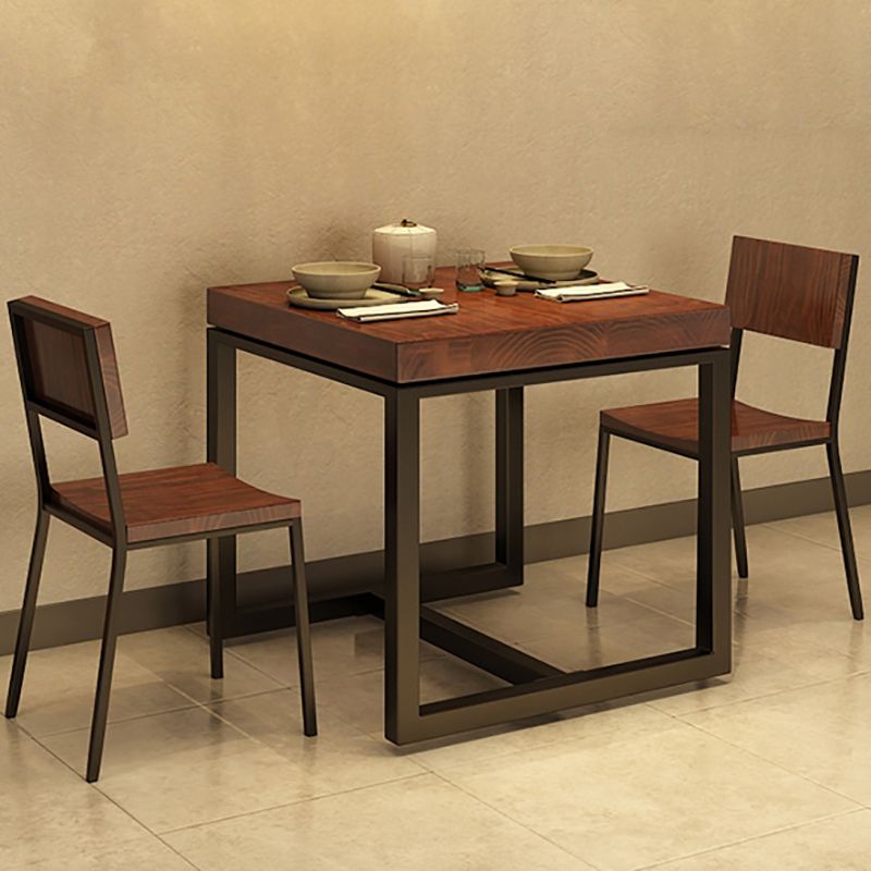 Mesa de comedor superior de madera maciza Mesa cuadrada industrial con base de caballete de hierro negro