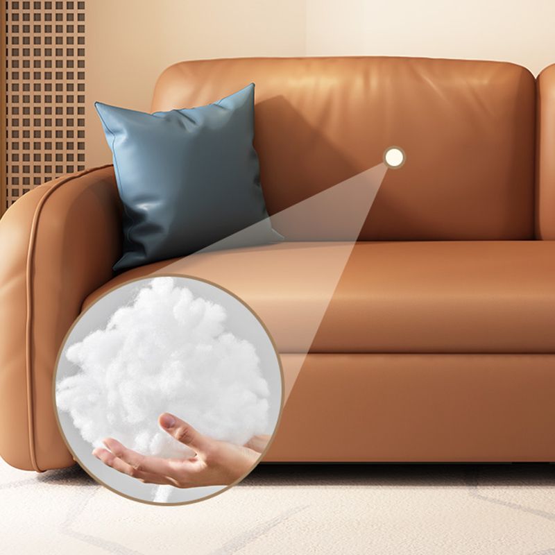 茶色の枕付きフェイクレザーソファー