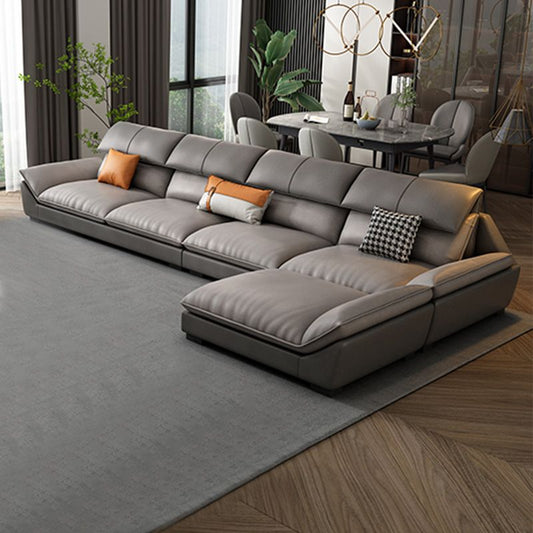 Faux lederen retro bank en chaise grijze kussen bovenarm bank