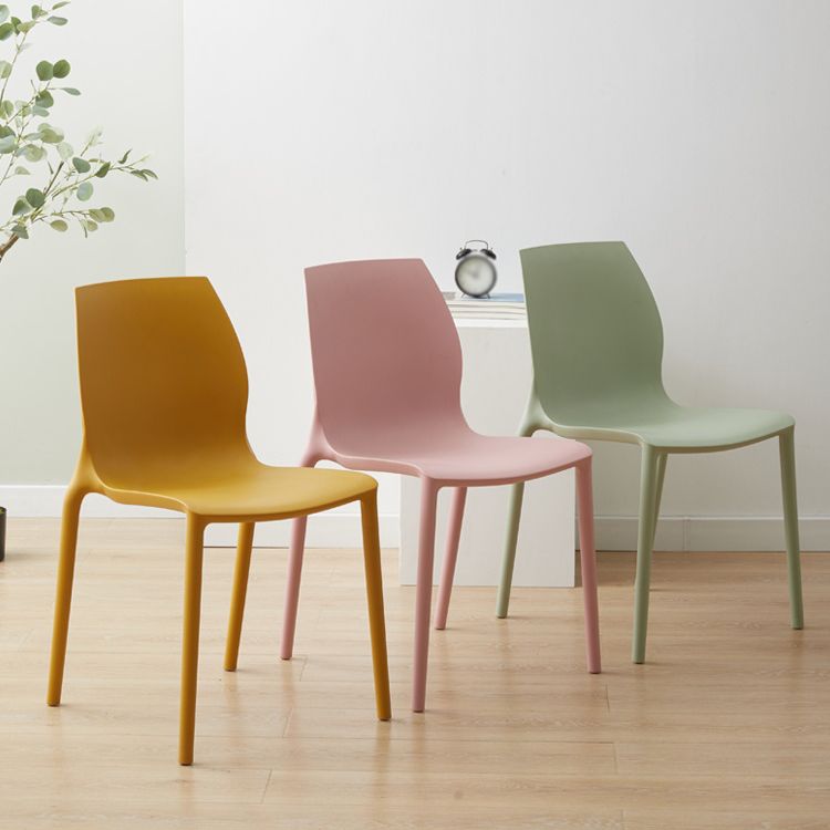 Scandinavian Armless Dining Chairs Plastic Indoor Stackable Solid Back Side Chair Clearhalo ' kitchen&dining_furn' 'Dining Chairs' 'Dining Tables & Seating' 'dining_chair' 'furn' 'furn_dining_chair' 'Furniture' 'furniture_dining_chair' 'Kitchen & Dining Furniture' 'kitchen' 1200x1200_0e352aca-0c2c-4a03-9386-70ca5c643b46