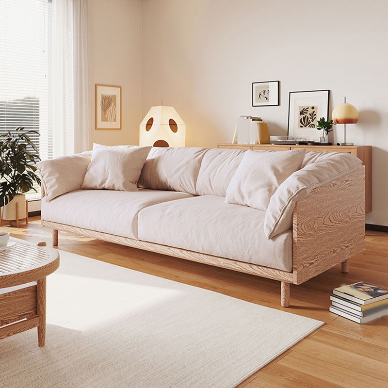 Scandinavische losse achterbank met kussen bovenarm in massief hout en linnen