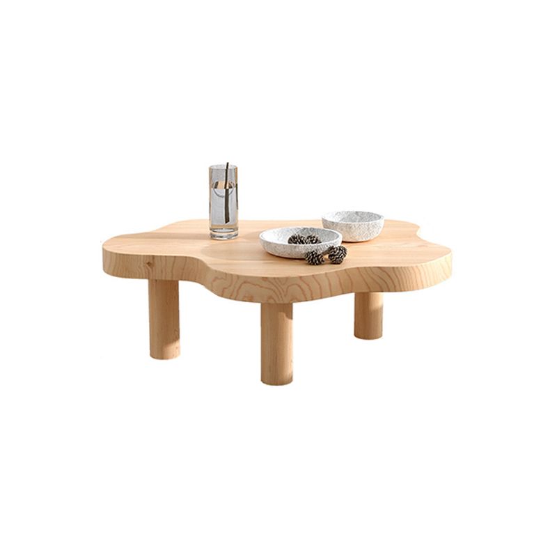 Table basse scandinave de forme libre avec 3 pieds en bois de pin