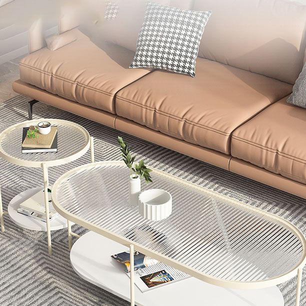 4 Legs Metal Coffee Table Shelf Included Oval Glass Top Cocktail Table Clearhalo 'Coffee & Accent Tables' 'Coffee Tables' 'coffee_tables' 'furn' 'furn_coffee_tables' 'Furniture' 'Living Room Furniture' 1200x1200_115e11d8-112a-4ee2-aa40-0a4c270d1078