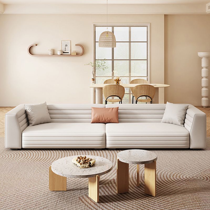 白い現代標準のタイトな背面腕ソファソファ