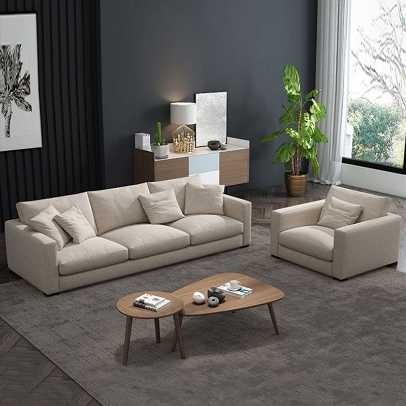 Canapé de bras carré standard avec oreillers siège en beige pour l'appartement