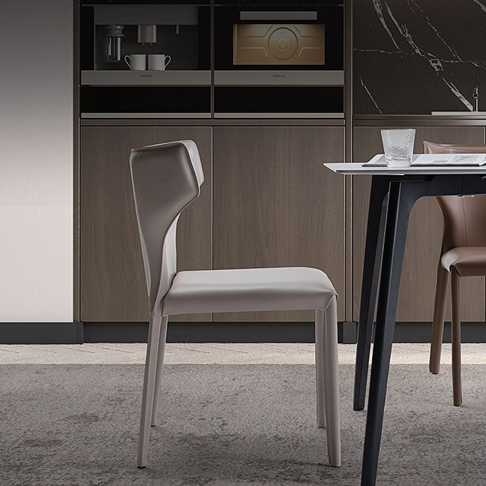 Moderne lederen armloze eetkamerstoel Wingback Side Chair voor restaurantgebruik