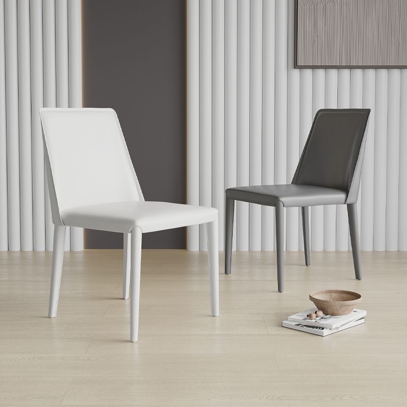 Sillas de comedor sin brazo de la espalda baja silla lateral moderna de cuero falso
