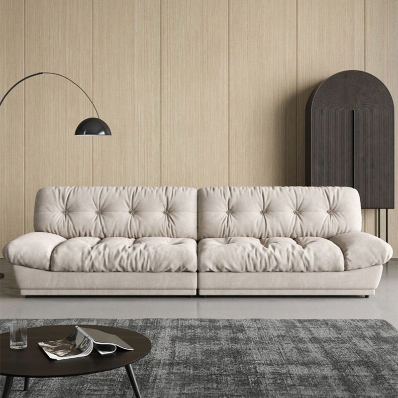 Canapé contemporain sans bras en velours blanc avec dos touflé pour le salon