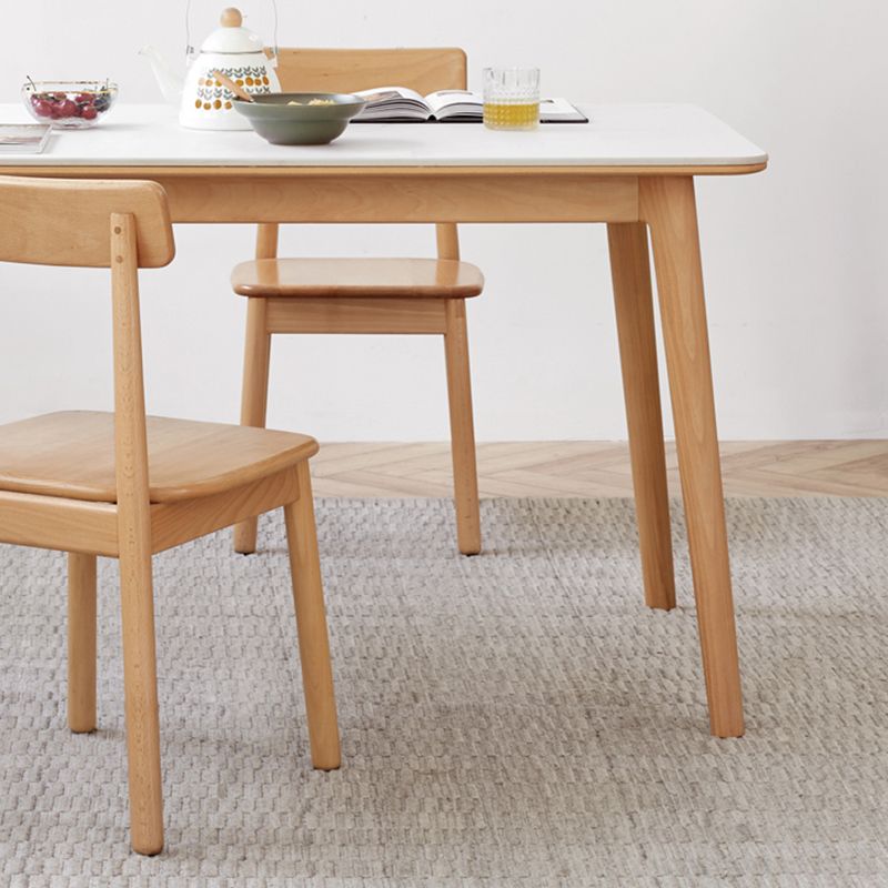 Mesa de comedor rectangular de piedra moderna con patas de madera para comedor