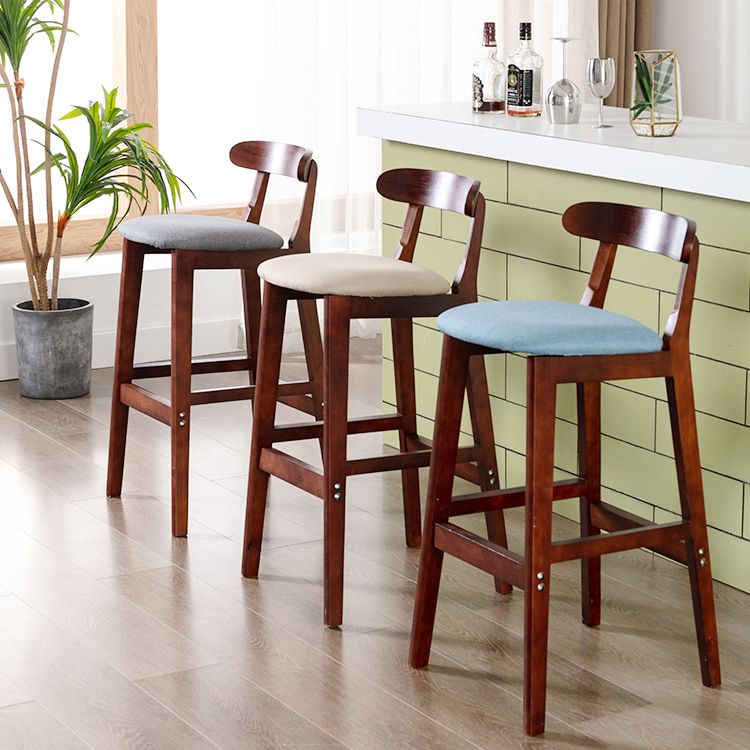 Modern Armless Counter Stool Wood Household Bar Stool with Pedal and Cushion Clearhalo 'Bar Furniture' 'Bar Stools' 'bar_stools' 'furn' 'furn_bar_stools' 'furniture_bar_stools' 'Kitchen & Dining Furniture' 'kitchen&dining_furn' 'kitchen' 'kitchen_furn' Furniture' 1200x1200_19ab37df-86b1-48d1-ad64-e861c31f5181