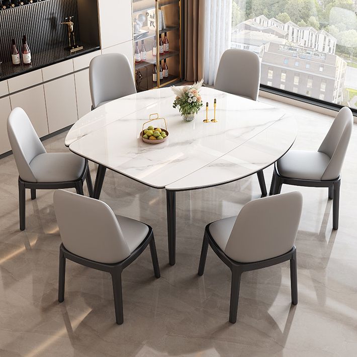 Tavolo da pranzo moderno allungabile in pietra con base in legno per sala da pranzo