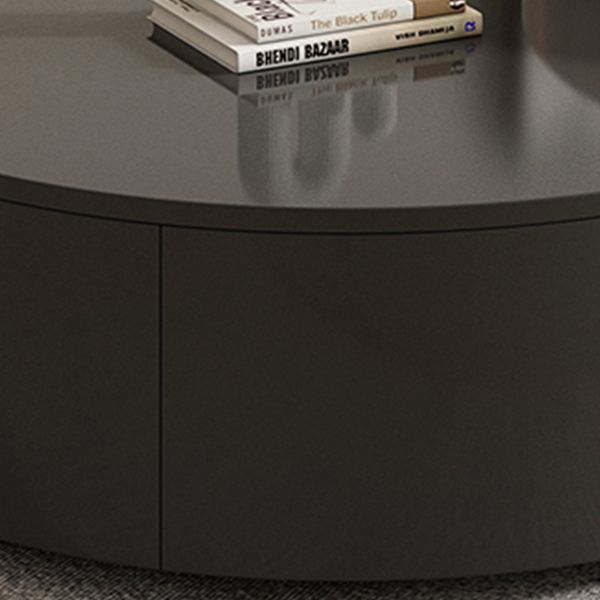 Eigentijdse ronde leisteen nestelende salontafel ingesteld met opslag