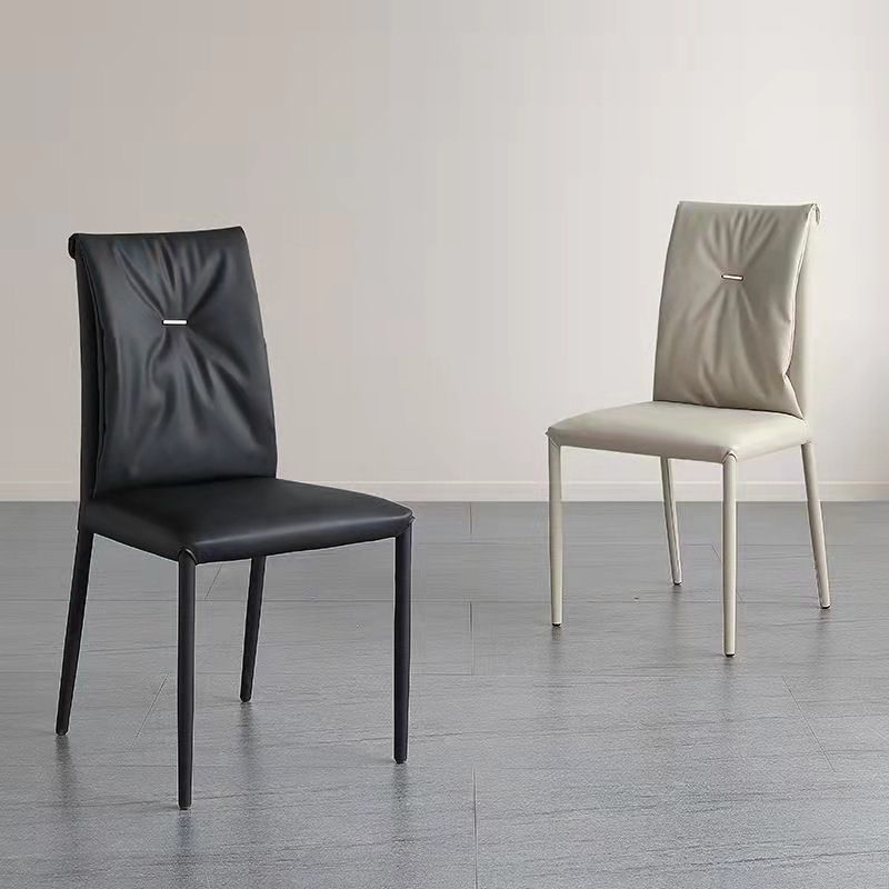 Eigentijdse faux lederen eetkamerstoelen metalen armloze eetkamerstoel voor thuisgebruik