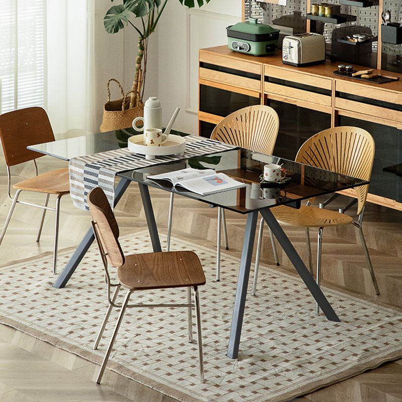 Tavolo da pranzo rettangolare in vetro rettangolare contemporaneo con gambe in acciaio