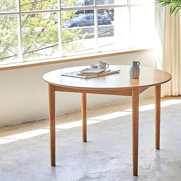 丸いダイニングテーブルモダン4脚木の色固定材のテーブル
