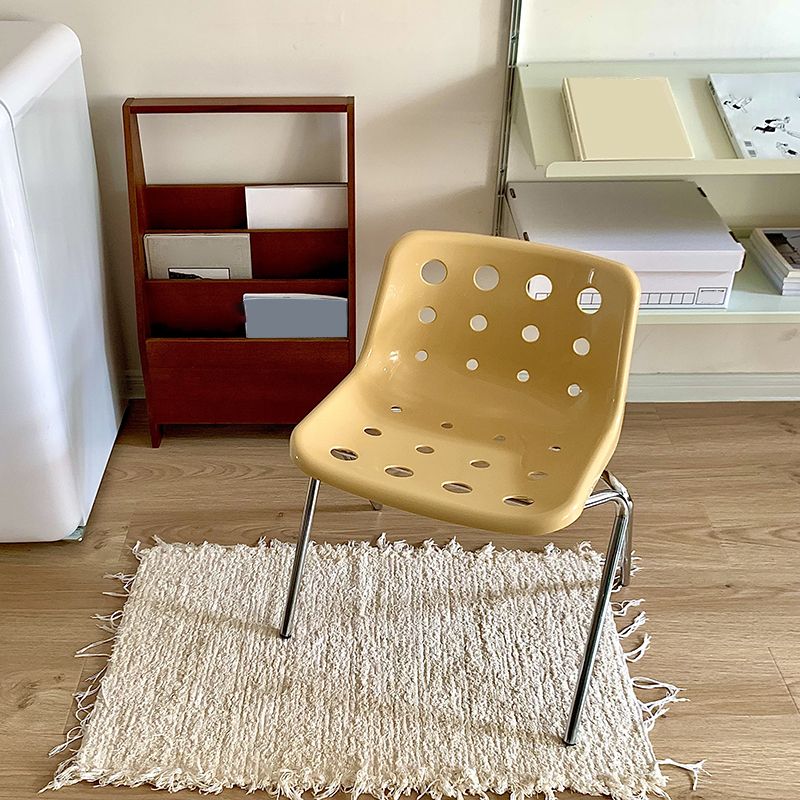 Moderner armloser Rückenlehne Acrylstuhl mit Metallbeinen für Esszimmer