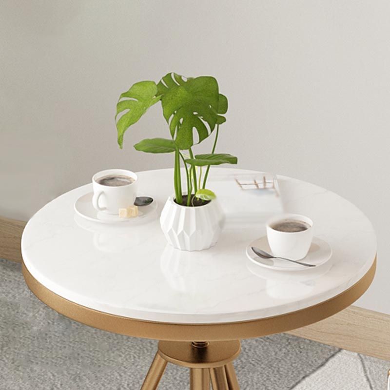 Tavolo da pranzo rotondo tradizionale tavolo in marmo con base in metallo oro