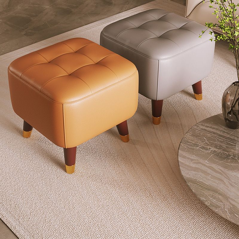 Otomático otomático de cuero genuino moderno otomano de mediados de siglo con patas de silla