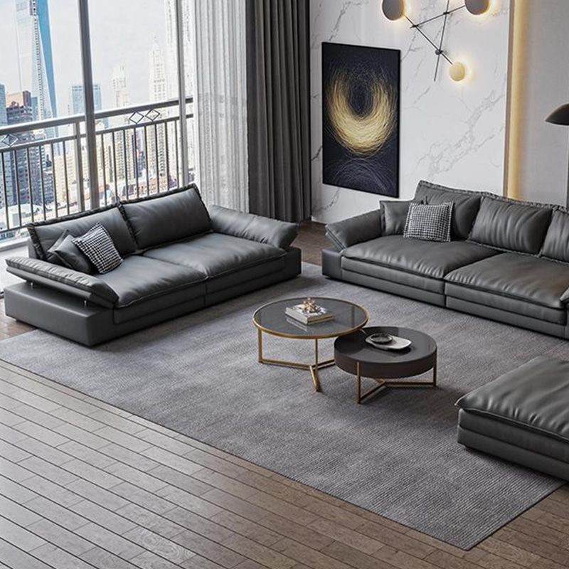 Mid Century Modern Black Sofa with Pillow Top Arm and Loose Back