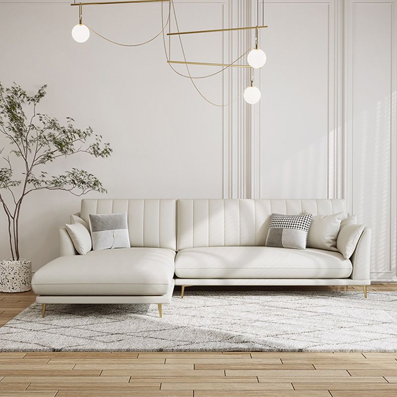 Sloped Arm Sofa with Chaise in White Sewn Pillow Back Faux Leather Sofa - 68.9" D