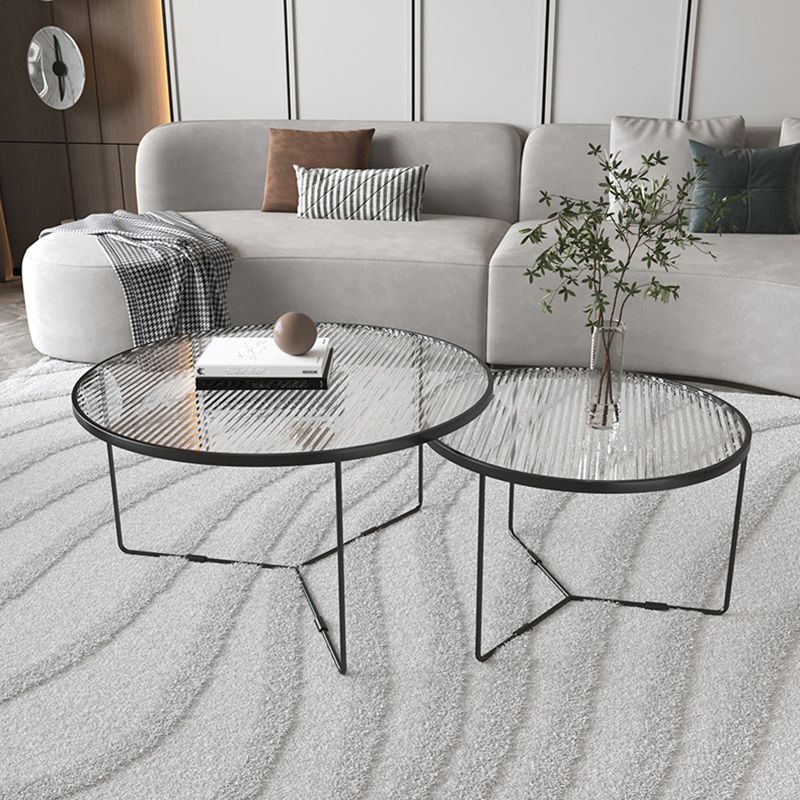 Moderner Stil runder geschärfter Glas Tisch mit Metallkreuzbeinen Couchtisch