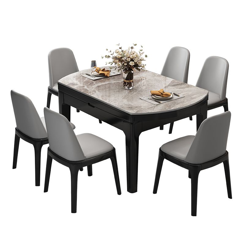 Moderner runder graues Steinoberteil ausziehbar einziehbarer Esstisch mit 4 schwarzen Beinen mit Gummiholzbeinen