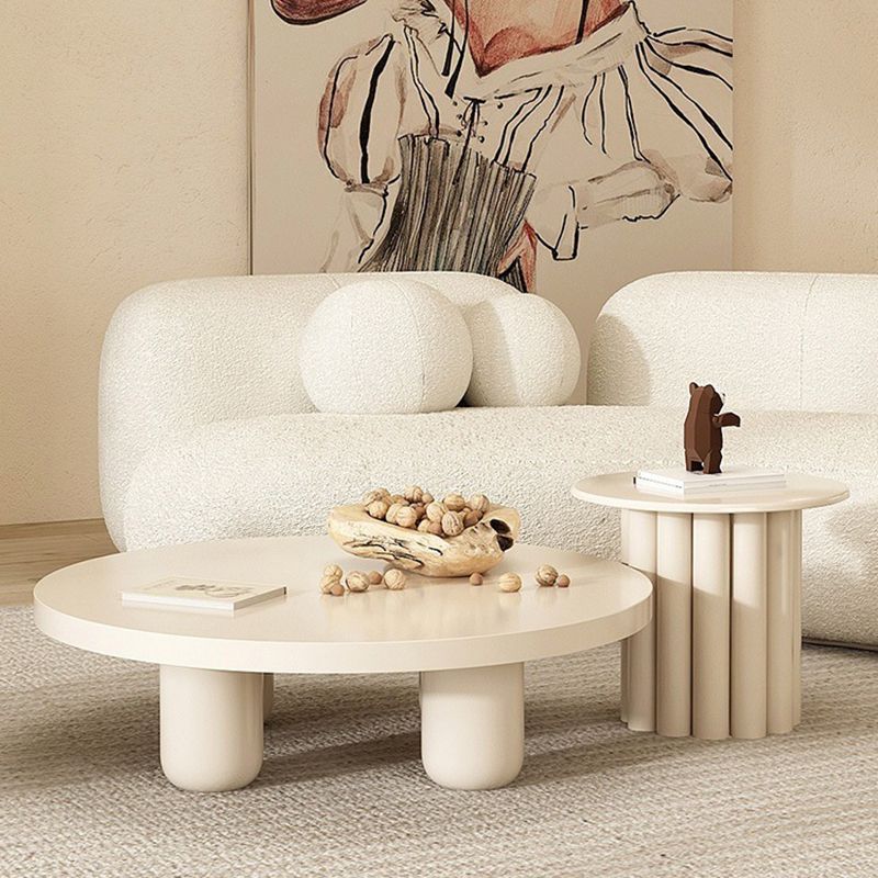 Skandinavischer runder Couchtisch aus Holz mit 4 Beinen / Sockel-Cocktailtisch
