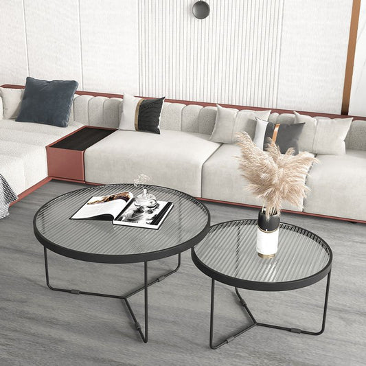 Tavolino contemporaneo di caffettiera con nidificazione rotonda con top in vetro e base di ferro