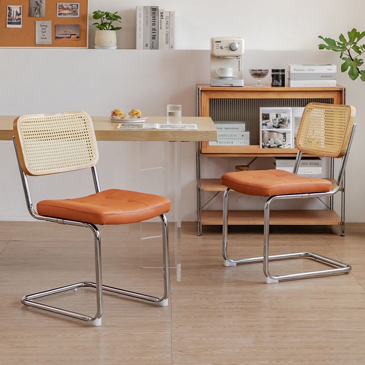 Silla lateral tapizada silla de brazo trasero de estilo moderno con base cromada