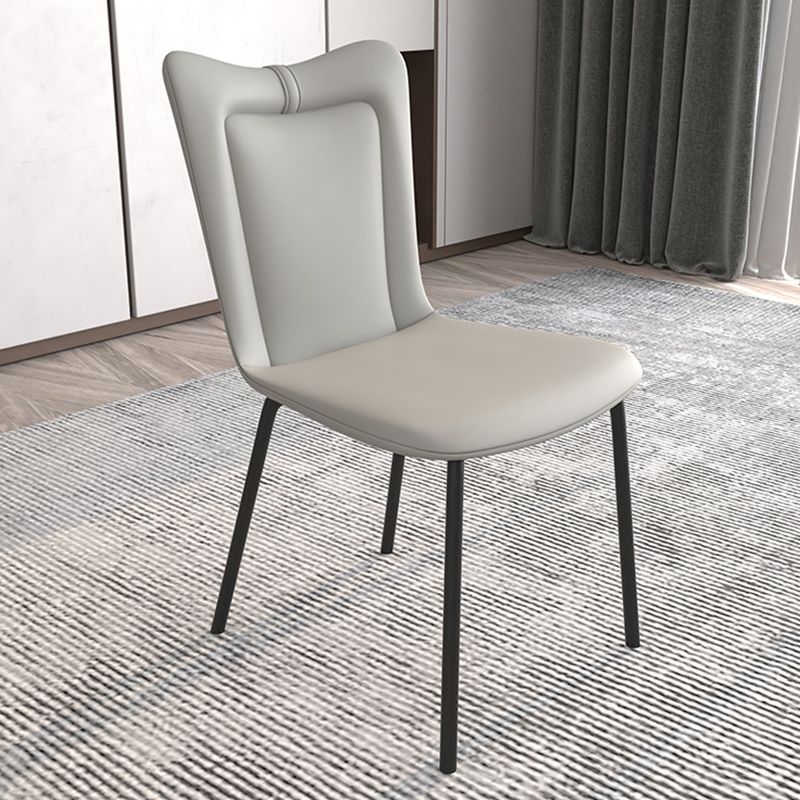 Black Iron Legs Dining Chairs Modern Faux Leather Armless Side Chair Clearhalo 'Dining Chairs' 'Dining Tables & Seating' 'dining_chair' 'furn' 'furn_dining_chair' 'Furniture' 'Kitchen & Dining Furniture' 1200x1200_24fbec1a-efec-4b5e-bae1-fa673a273bc2