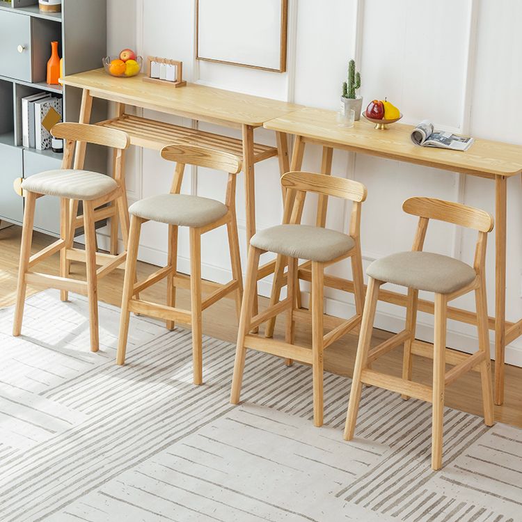 Pie de contraataque industrial Taburete de Counterless Café de madera con pedal y cojín