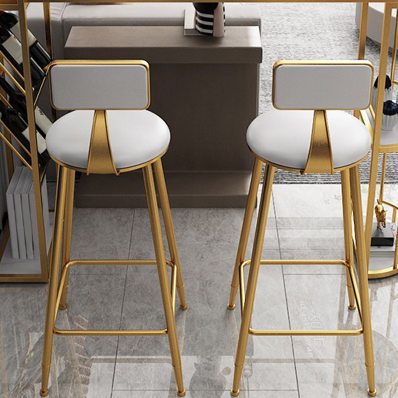 Lage rug faux lederen eetgelegen krukeloze barkrukken met metalen basis