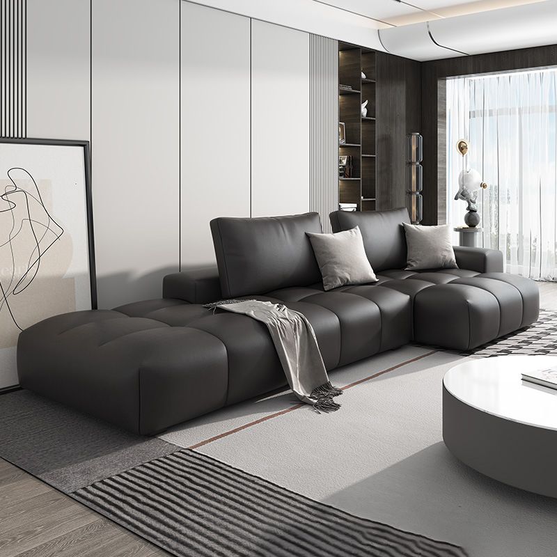 Un côté accoudoir du côté canapé arrière-lit en cuir d'imitation noire canapé en cuir