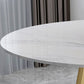 Mesa de comedor redonda contemporánea Mesa de pedestal de hierro con tapa de piedra sinterizada