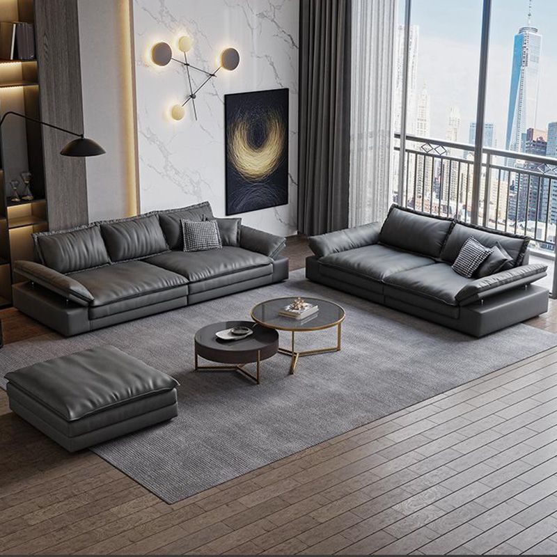 Canapé noir moderne du milieu du siècle avec un bras toret et dos lâche