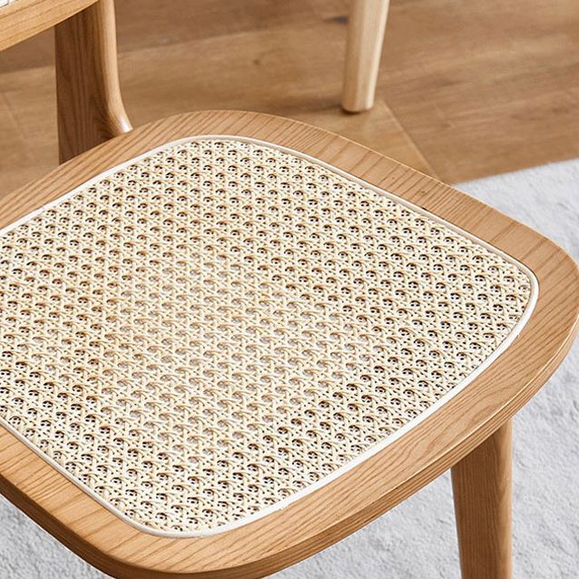 Sillas de comedor de ratán modernas muebles de comedor abiertos con patas de madera en acabado mate