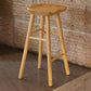 Taburete de bar de madera sin respaldo moderno con pedal y asiento de madera