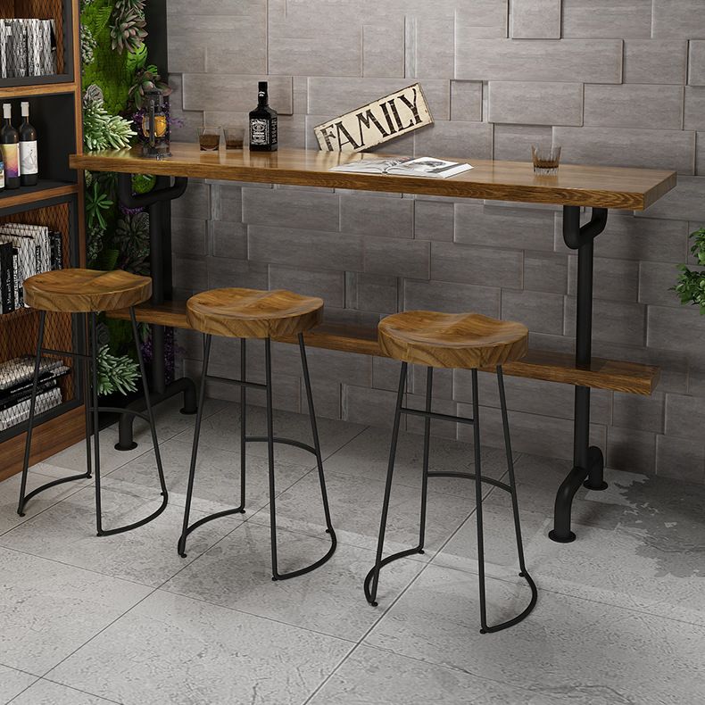 Tavolo da pranzo a bar in legno tradizionale tavolo da bar di lusso con base di cavalletto in nero