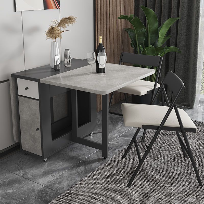 Mesa de comedor moderna plegable con tapa de madera, extensible para espacios pequeños en gris
