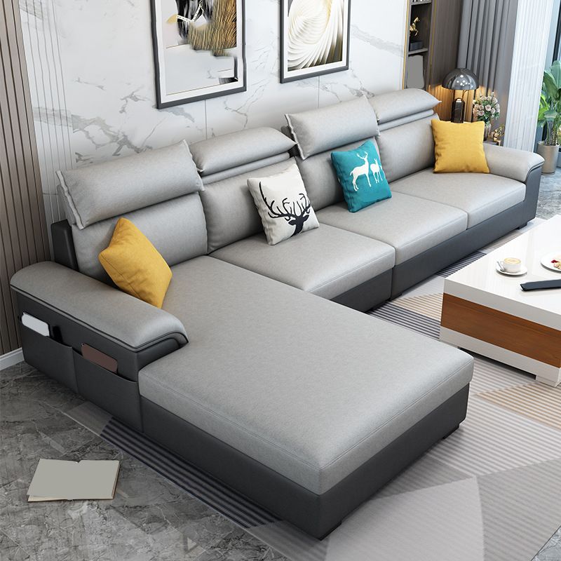 モダンスタイルのソファベッドソリッドウッドフレーム模倣レザービルトインアームレストソファ