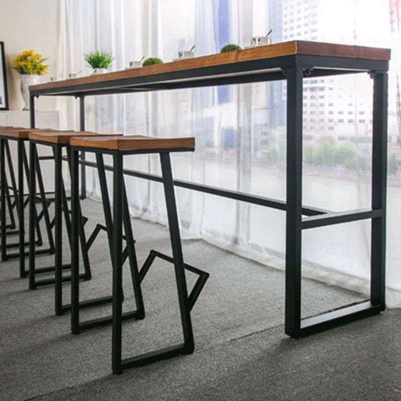 Wood Top Table with Black Legs and Metal Base Kitchen Bar Table Clearhalo 'Bar Furniture' 'Bar Tables' 'bar_tables' 'furn' 'furn_bar_tables' 'Furniture' 'Kitchen & Dining Furniture' 1200x1200_2a8dfd27-b19e-4a5b-af86-826e602b5cf5